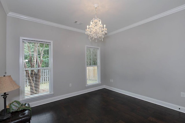 1537 Magnolia Way, Columbus, GA 31904 - spare room with a chandelier, crown molding, and dark wood-style flooring