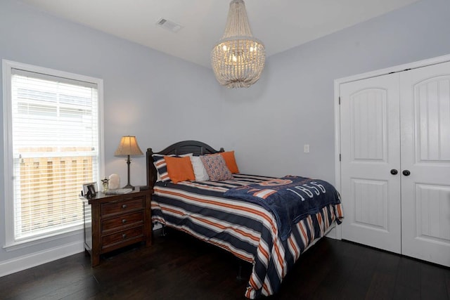1537 Magnolia Way, Columbus, GA 31904 - bedroom featuring hardwood / wood-style flooring, a chandelier, and a closet