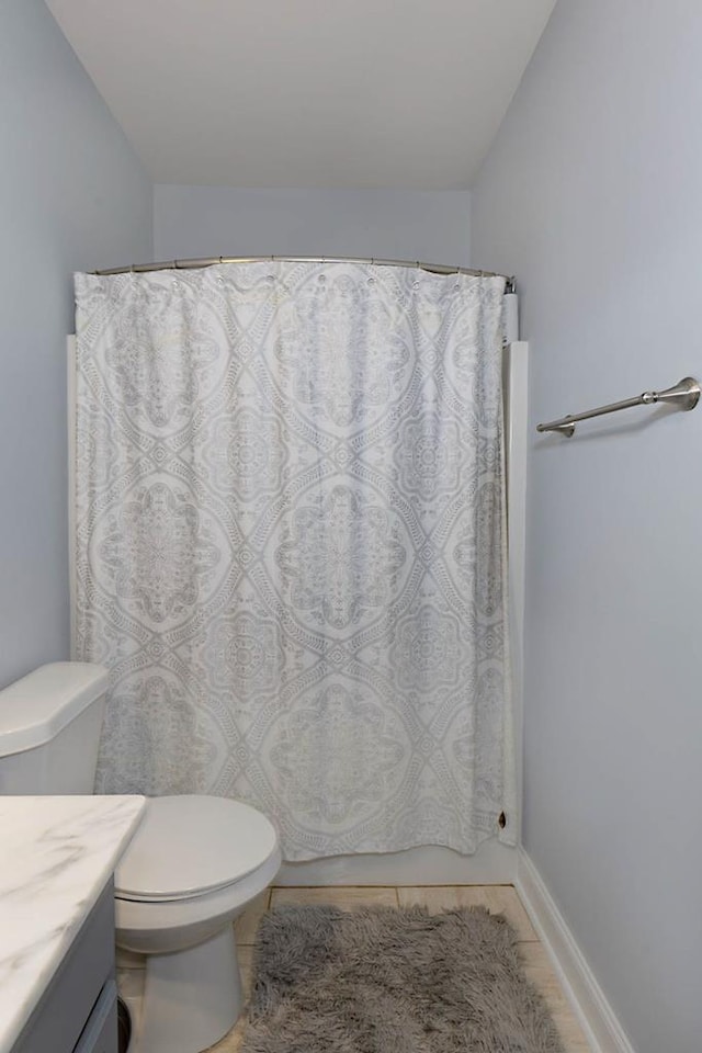 1537 Magnolia Way, Columbus, GA 31904 - full bath with vanity, tile patterned floors, and a shower with shower curtain