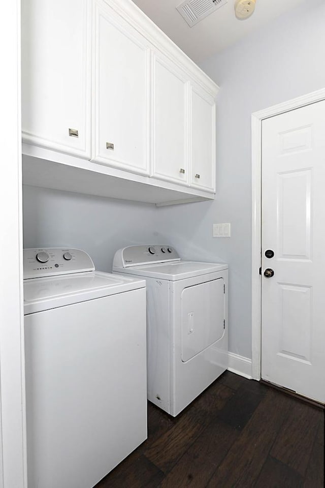 1537 Magnolia Way, Columbus, GA 31904 - washroom featuring independent washer and dryer, cabinet space, and dark wood-style floors