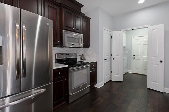 1537 Magnolia Way, Columbus, GA 31904 - kitchen with appliances with stainless steel finishes, dark wood finished floors, dark brown cabinets, tasteful backsplash, and recessed lighting