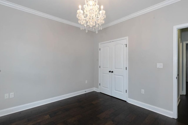 1537 Magnolia Way, Columbus, GA 31904 - unfurnished room featuring dark wood-style flooring, a chandelier, and ornamental molding