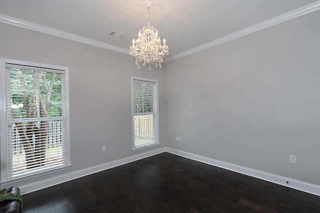 1537 Magnolia Way, Columbus, GA 31904 - empty room featuring a chandelier, crown molding, and dark wood-type flooring