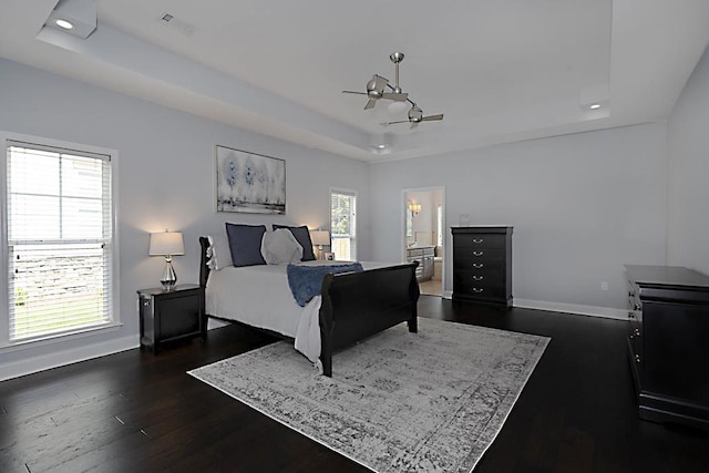 1537 Magnolia Way, Columbus, GA 31904 - bedroom with a raised ceiling, dark wood-style flooring, recessed lighting, and ensuite bathroom