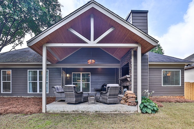 1537 Magnolia Way, Columbus, GA 31904 - rear view of house featuring a patio area, an outdoor living space, and a chimney