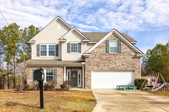 view of front of property featuring a garage