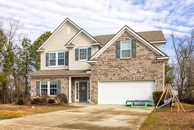 view of front of home with a garage