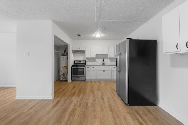 kitchen featuring white cabinetry, sink, stainless steel appliances, gas water heater, and light hardwood / wood-style floors