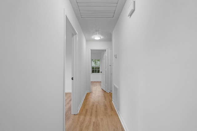 hall featuring light hardwood / wood-style flooring