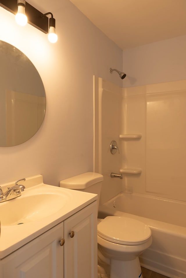 full bathroom featuring vanity, shower / bathing tub combination, and toilet