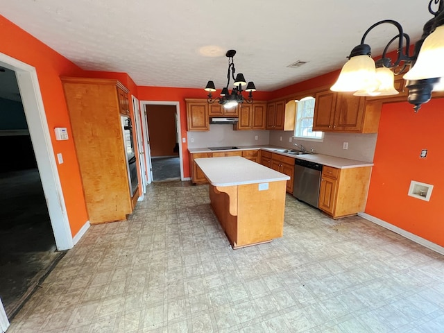 kitchen with decorative light fixtures, stainless steel dishwasher, a kitchen island, a notable chandelier, and black electric stovetop