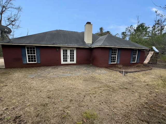 back of property featuring french doors