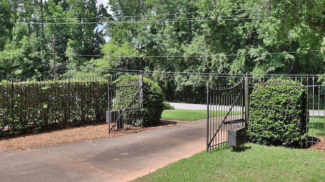 view of street featuring a gate