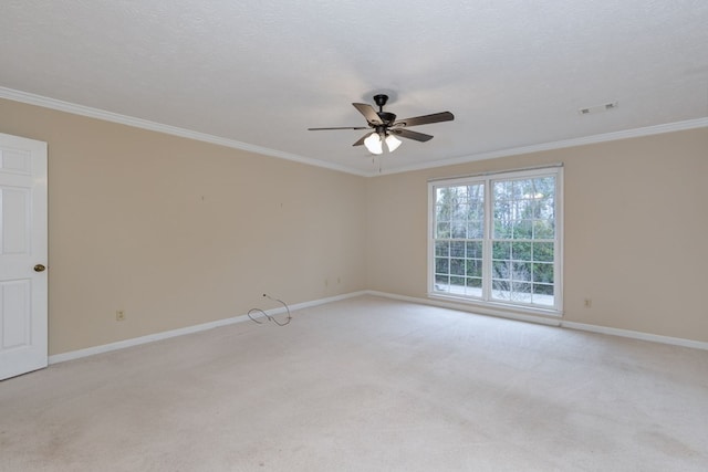 unfurnished room featuring a ceiling fan, baseboards, visible vents, ornamental molding, and light carpet