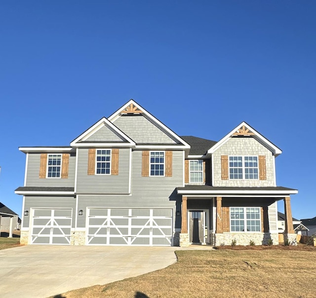 craftsman inspired home with a garage