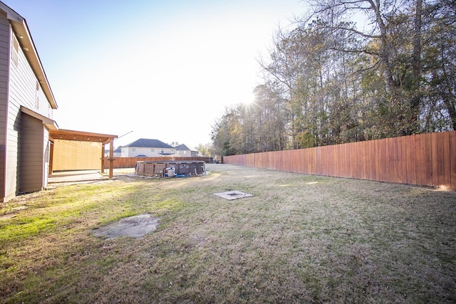 view of yard featuring a fenced in pool