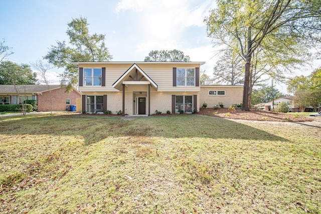 front facade with a front lawn