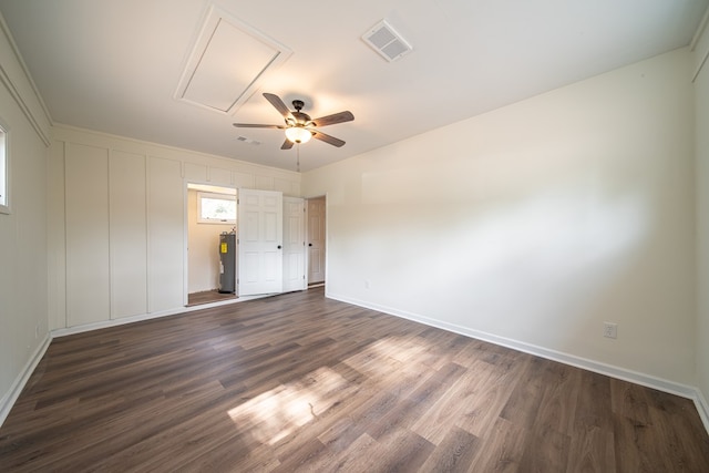 unfurnished bedroom with dark hardwood / wood-style floors and ceiling fan