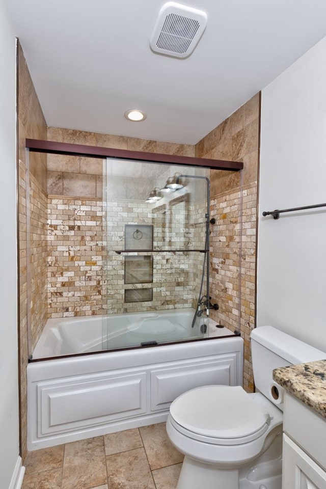 full bathroom with toilet, visible vents, combined bath / shower with glass door, and vanity