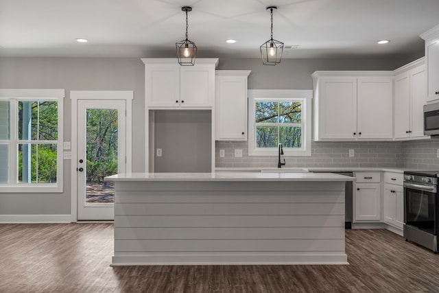 204 Lee Rd Unit 0334, Salem, AL 36874 - kitchen with light countertops, stainless steel appliances, backsplash, a sink, and white cabinets