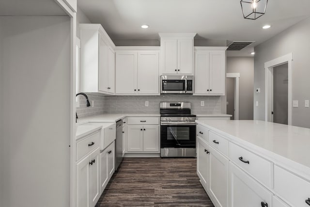 204 Lee Rd Unit 0334, Salem, AL 36874 - kitchen with visible vents, light countertops, appliances with stainless steel finishes, and white cabinets