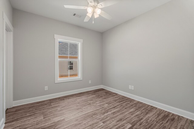 204 Lee Rd Unit 0334, Salem, AL 36874 - unfurnished room featuring a ceiling fan, dark wood-style flooring, baseboards, and visible vents