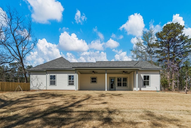 204 Lee Rd Unit 0334, Salem, AL 36874 - rear view of house with a lawn, fence, roof with shingles, and a ceiling fan