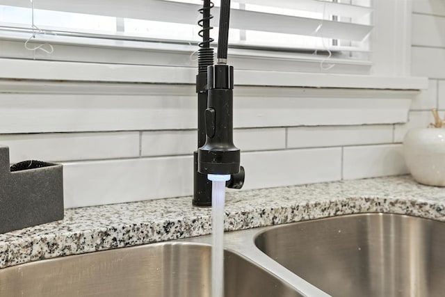 2901 Peabody Ave, Columbus, GA 31904 - kitchen view of light stone counters and tasteful backsplash