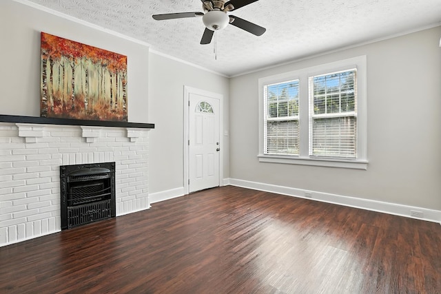 2901 Peabody Ave, Columbus, GA 31904 - unfurnished living room with wood finished floors, a textured ceiling, a ceiling fan, a fireplace, and crown molding