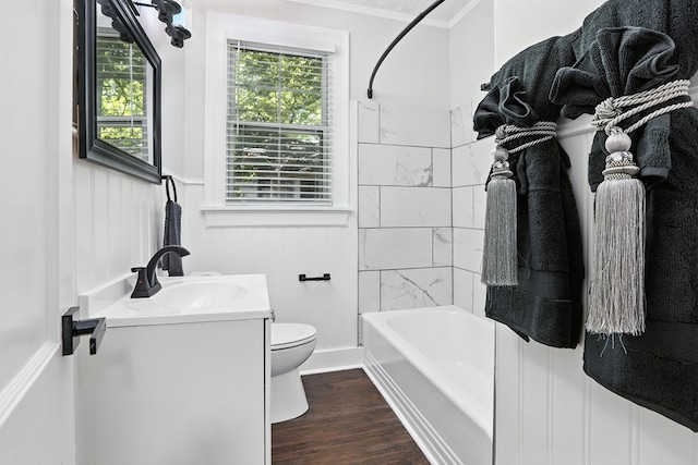 2901 Peabody Ave, Columbus, GA 31904 - bathroom with vanity, wood finished floors, crown molding, and washtub / shower combination