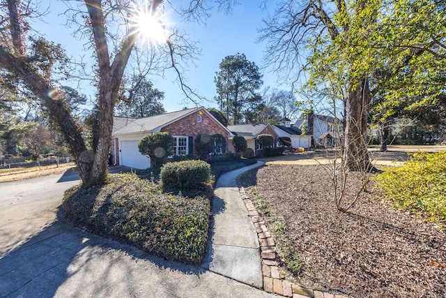 single story home featuring a garage