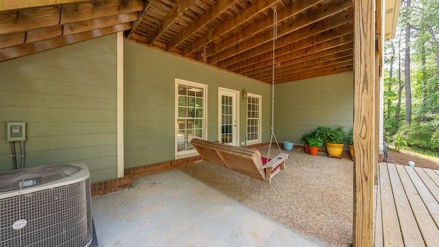view of patio with central AC and french doors