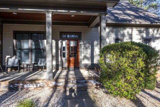 entrance to property with a porch