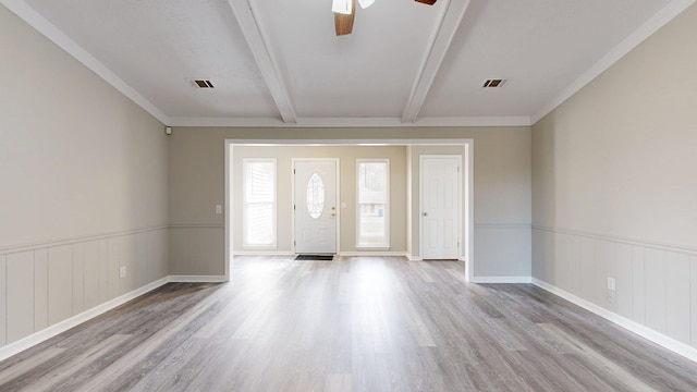 entrance foyer featuring beamed ceiling, ceiling fan, and light wood-type flooring