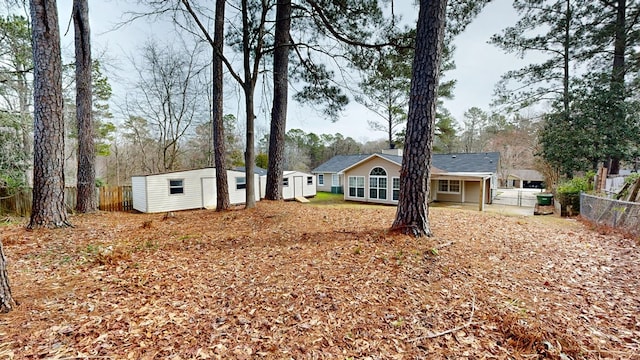 exterior space featuring a shed