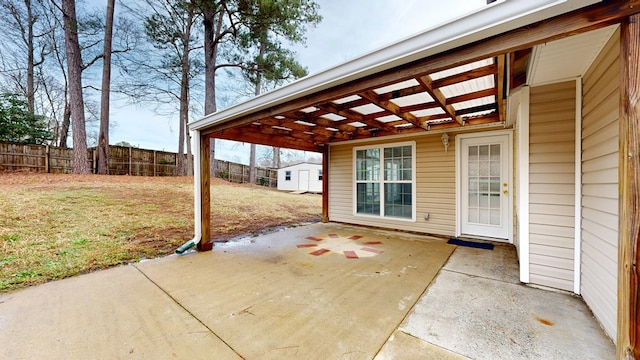 view of patio / terrace with a storage shed