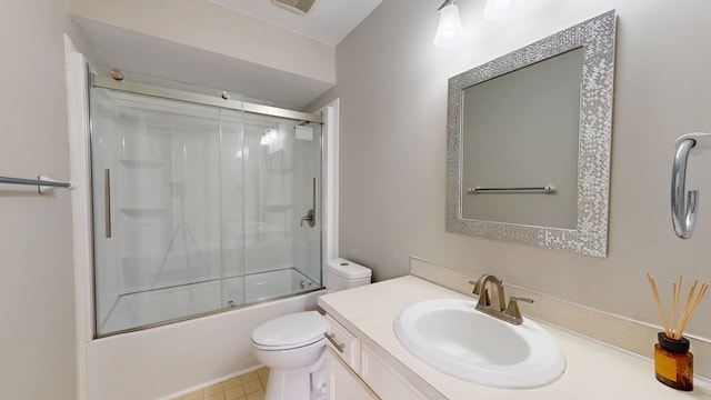 full bathroom featuring vanity, toilet, and combined bath / shower with glass door