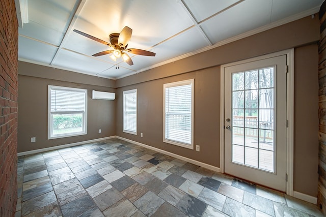 empty room featuring baseboards, a wall mounted air conditioner, a ceiling fan, and stone tile flooring