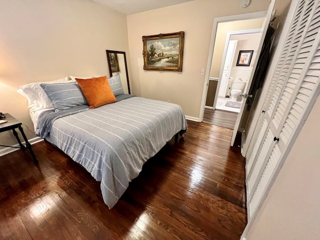 bedroom featuring baseboards and wood-type flooring