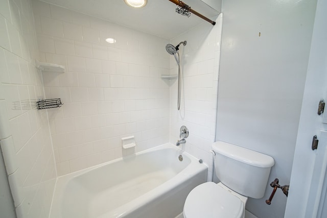 bathroom with toilet and washtub / shower combination