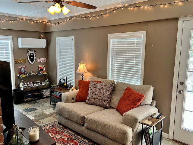 living area with ceiling fan and a wall unit AC