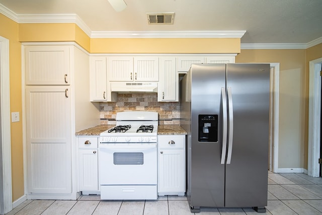 kitchen featuring visible vents, white range with gas stovetop, stainless steel fridge with ice dispenser, under cabinet range hood, and crown molding