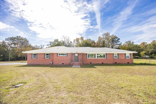 ranch-style home with a front yard