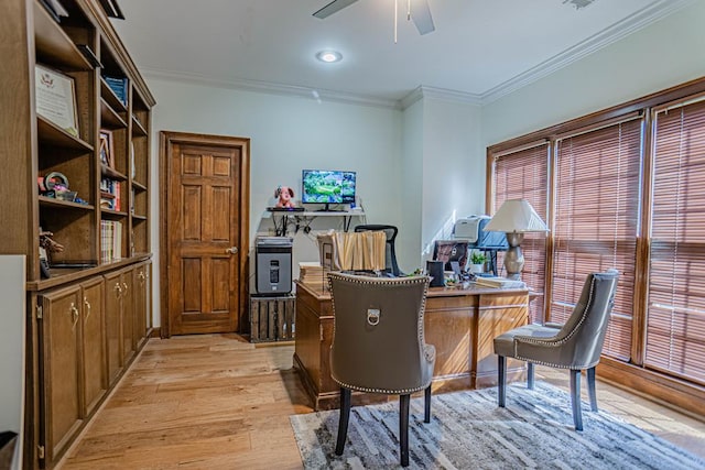 office space featuring ceiling fan, light hardwood / wood-style floors, and crown molding