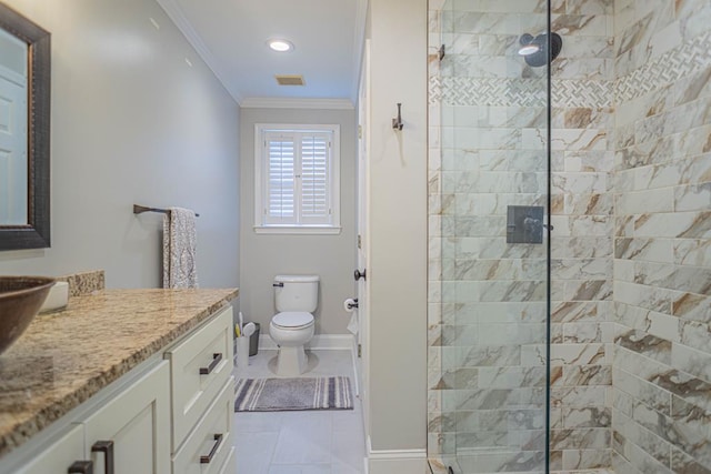 bathroom with vanity, crown molding, tile patterned flooring, toilet, and a tile shower