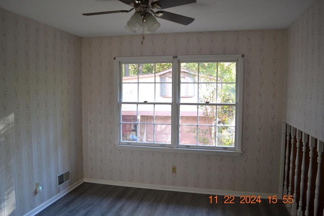 unfurnished room featuring ceiling fan and hardwood / wood-style flooring