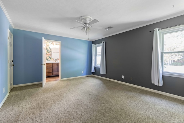 6215 Seaton Dr, Columbus, GA 31909 - carpeted spare room featuring a ceiling fan and crown molding