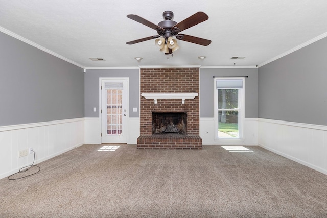 6215 Seaton Dr, Columbus, GA 31909 - unfurnished living room featuring wainscoting, carpet, a ceiling fan, ornamental molding, and a fireplace
