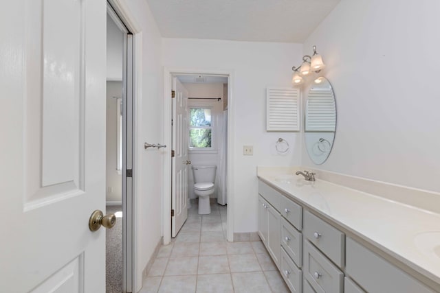 6215 Seaton Dr, Columbus, GA 31909 - full bathroom featuring double vanity and tile patterned flooring