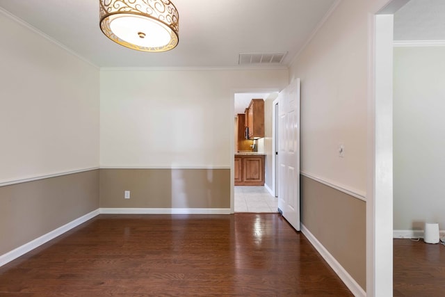 6215 Seaton Dr, Columbus, GA 31909 - unfurnished dining area featuring light wood-type flooring and crown molding
